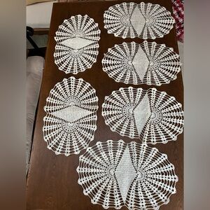 Crocheted placemats, set of 6. Each approximately 12” x 17-18” in EUC. Vintage.